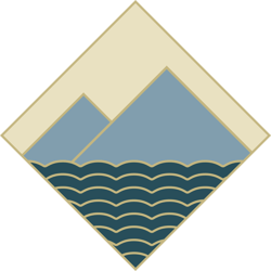 Mountains and grass badge