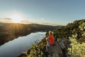 Shows a woman practicing mindfulness in nature. Symbolizes how anxiety treatment in Gallatin, TN will support you reconnect with yourself and your body.