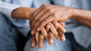 Photo shows a couple sitting down and holding hands. Marriage can be difficult but with relationship counseling in Gallatin, TN you can learn to maintain healthy relationships with your partner.
