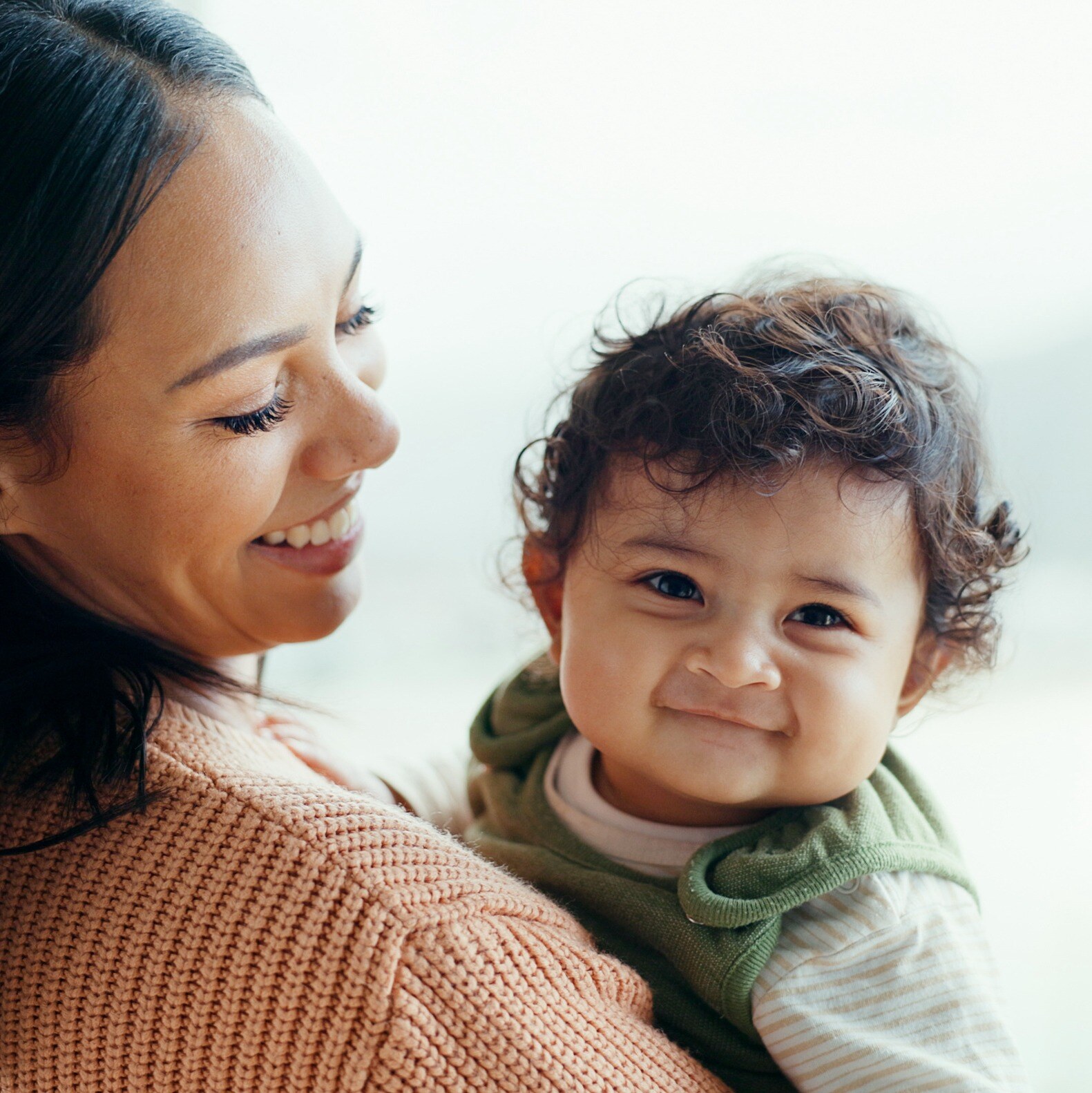 TN-Mental-Wellness-Postpartum-Fertility-lady-holding-baby-1