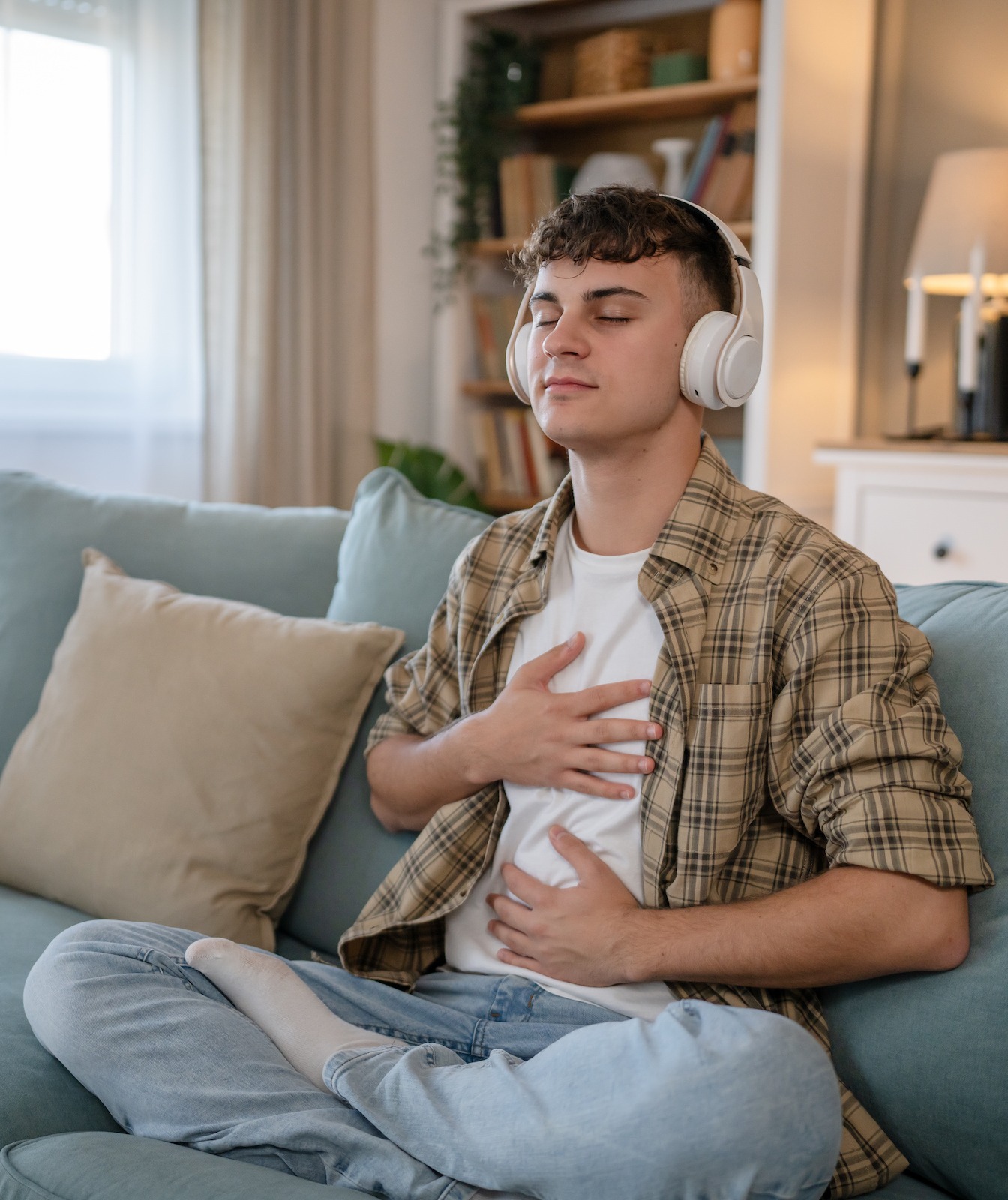 Man using headphones in a therapy session Man using headphones in a therapy session